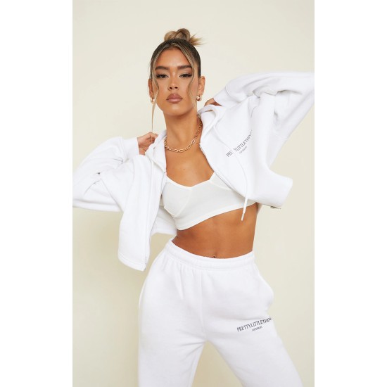 PRETTYLITTLETHING White Copyright Graphic Zip Through Crop Hoodie